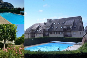 Appartement et son jardin dans résidence avec piscine